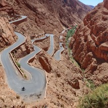 Marion cycles down the Dades Gorge (at the first hairpin bend).